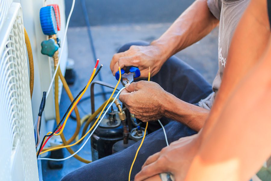 Air Conditioning Technician and A part of preparing to install new air conditioner.